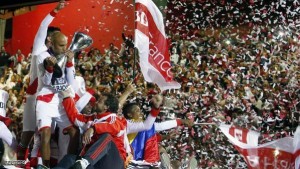 River Plate's Ledesma kisses the trophy after the team clinched the Argentine first division championship in Buenos Aires